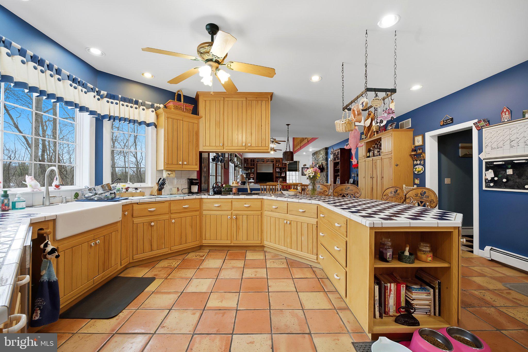 6688 Haasadahl Road Allentown, PA 18106 - Photo 13 of 31 Spacious kitchen with warm wood tones.