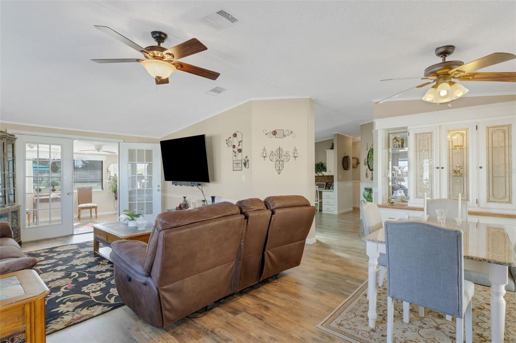 70 Mockingbird Lane Ellenton, FL 34222 - Photo 25 of 67 a living room with furniture and a flat screen tv