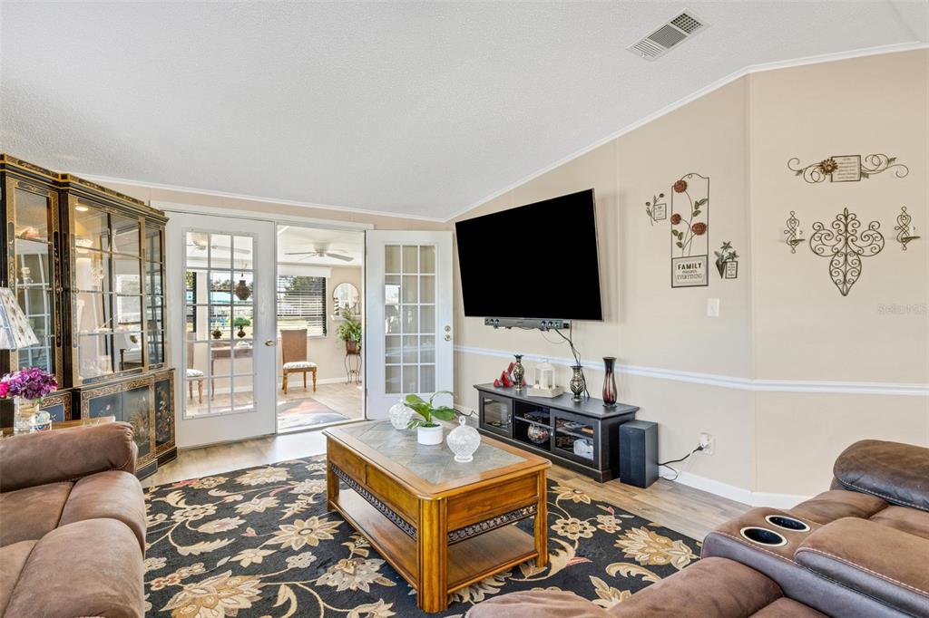 70 Mockingbird Lane Ellenton, FL 34222 - Photo 26 of 67 a living room with furniture and a flat screen tv