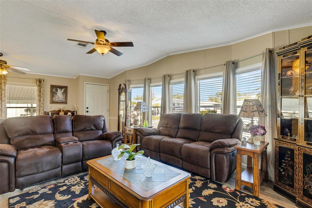 70 Mockingbird Lane Ellenton, FL 34222 - Photo 29 of 67 a living room with furniture and a window