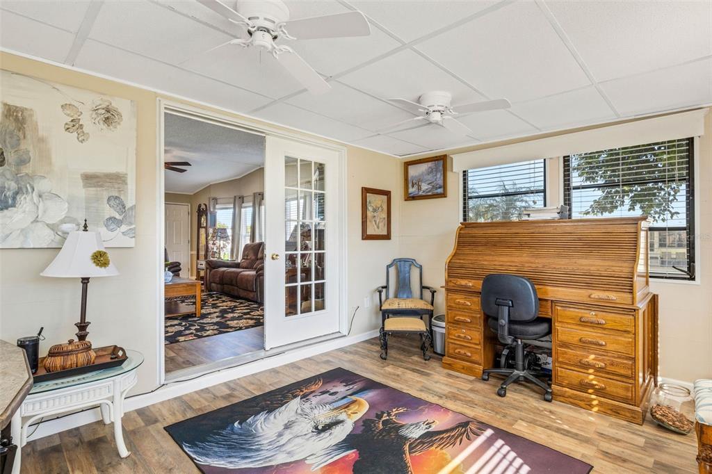 70 Mockingbird Lane Ellenton, FL 34222 - Photo 33 of 67 a living room with furniture and wooden floor