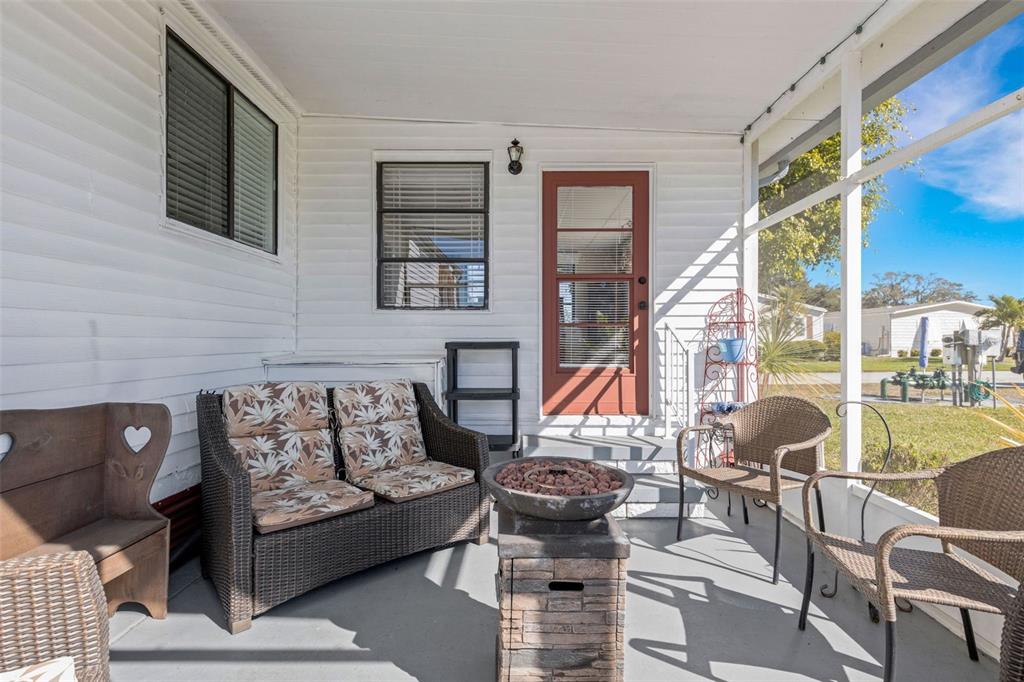 70 Mockingbird Lane Ellenton, FL 34222 - Photo 37 of 67 a living room with furniture and a large window