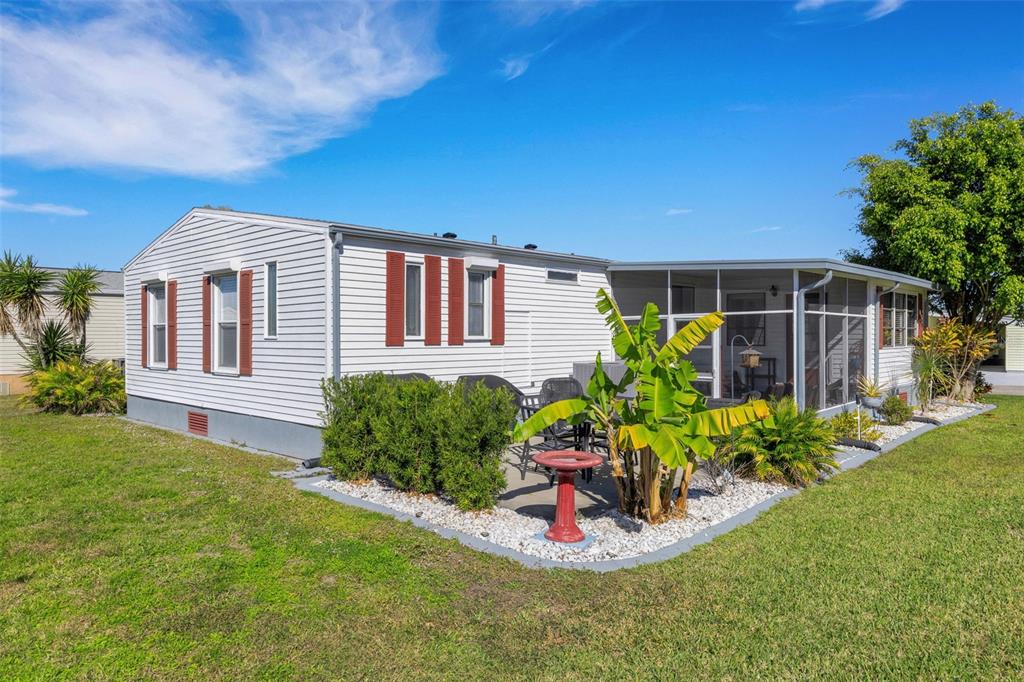 70 Mockingbird Lane Ellenton, FL 34222 - Photo 40 of 67 a view of a house with backyard and garden