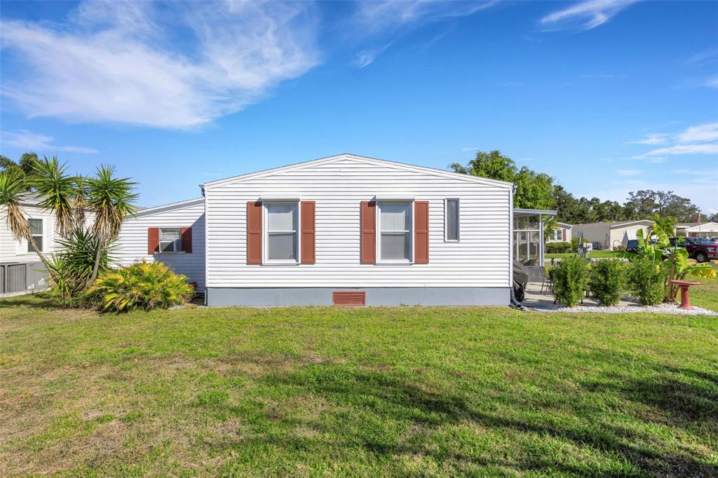 70 Mockingbird Lane Ellenton, FL 34222 - Photo 41 of 67 a front view of a house with a yard