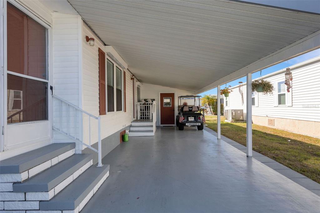 70 Mockingbird Lane Ellenton, FL 34222 - Photo 44 of 67 a view of an empty room with wooden floor and furniture