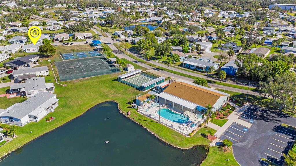 70 Mockingbird Lane Ellenton, FL 34222 - Photo 52 of 67 an aerial view of a house with a swimming pool yard and outdoor seating