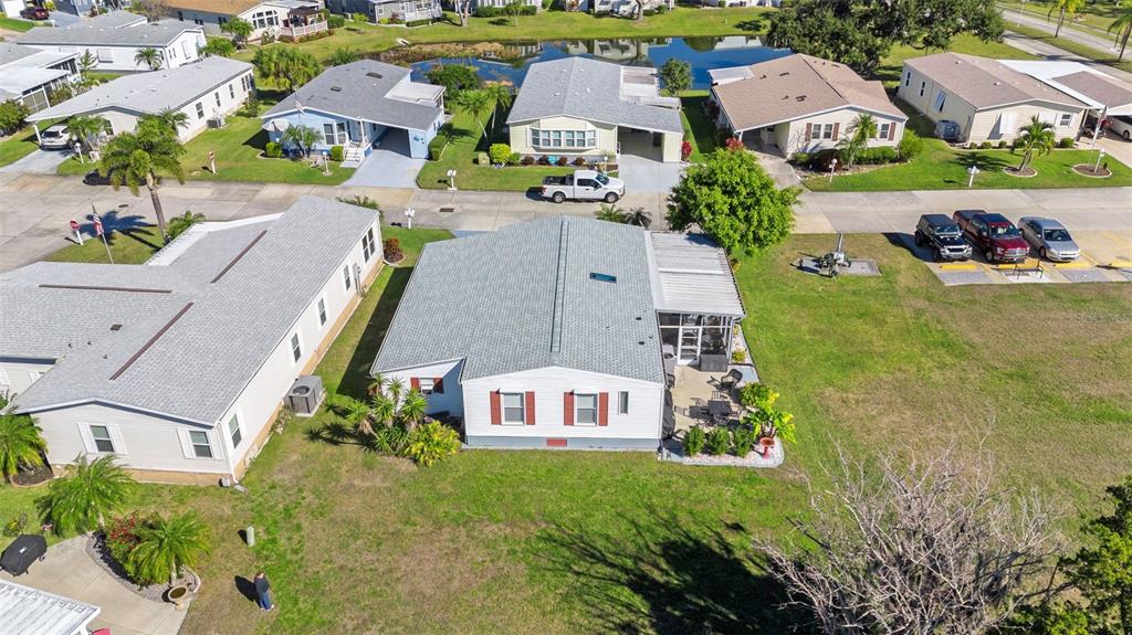 70 Mockingbird Lane Ellenton, FL 34222 - Photo 57 of 67 an aerial view of multiple houses with yard