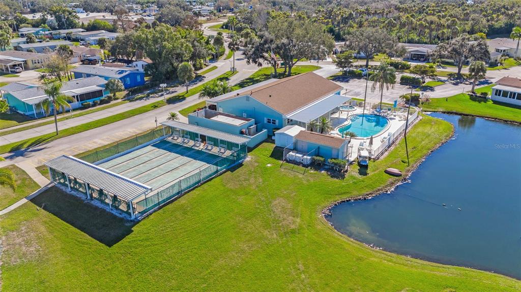 70 Mockingbird Lane Ellenton, FL 34222 - Photo 58 of 67 an aerial view of a house with a swimming pool