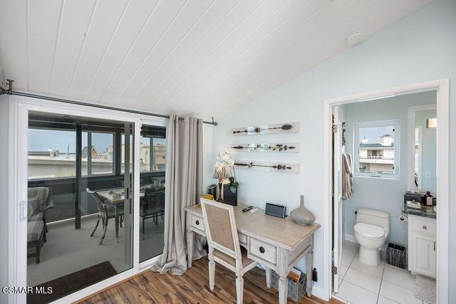 a room with a table and chairs