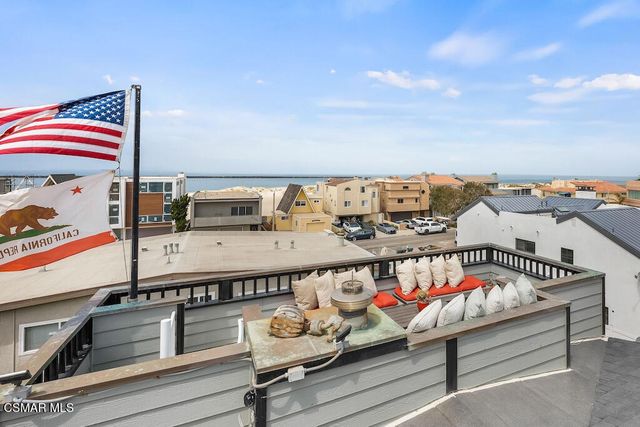 a view of a terrace with seating area