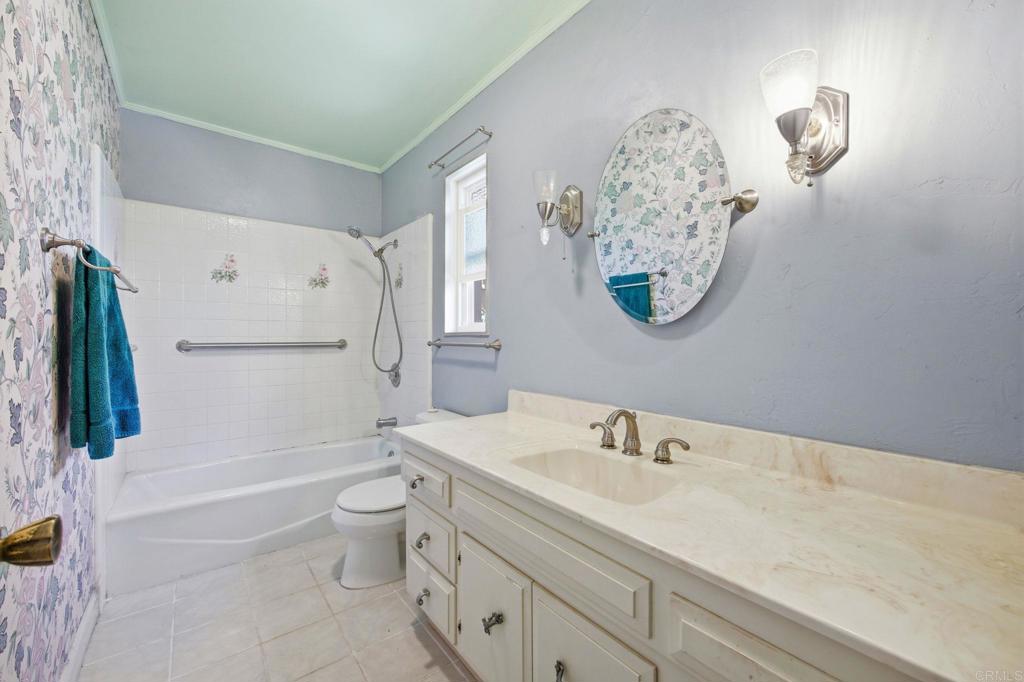 2807 South Grade Road Alpine, CA 91901 - Photo 24 of 42 a bathroom with a sink a toilet and a shower