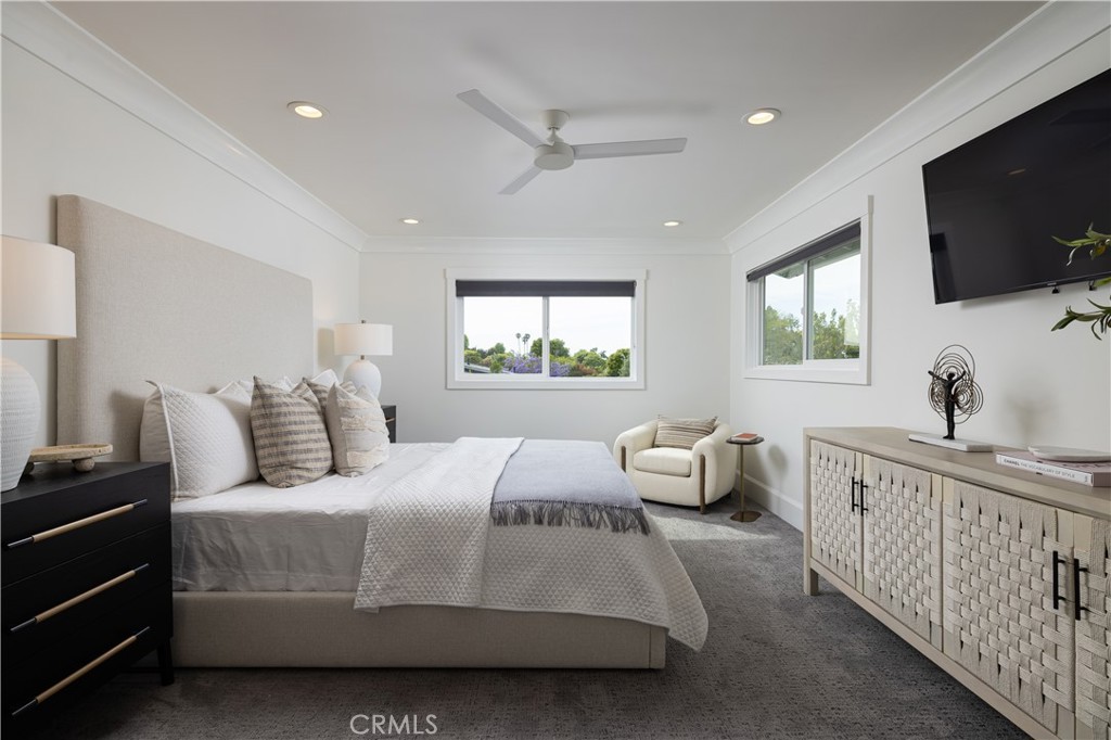 1609 Ruth Lane Newport Beach, CA 92660 - Photo 22 of 39 a bedroom with double bed and a flat screen tv