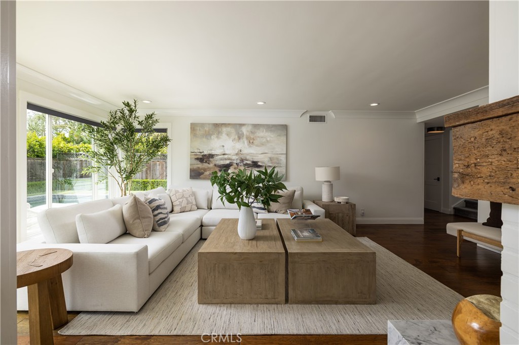 1609 Ruth Lane Newport Beach, CA 92660 - Photo 6 of 39 a living room with furniture and a flat screen tv