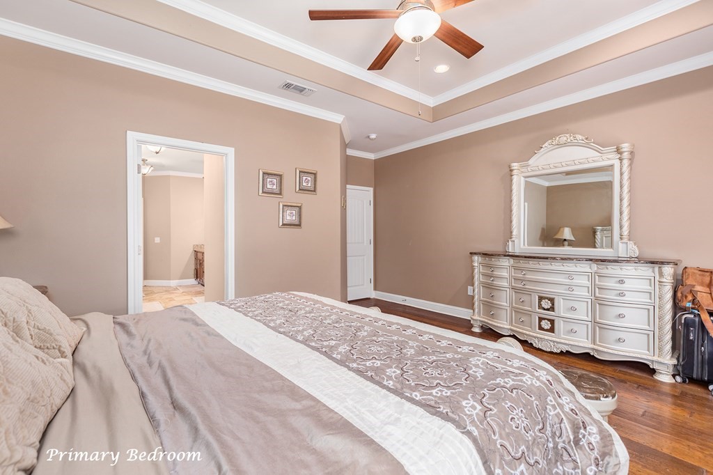 1171 Old Ewing Road Lufkin, TX 75901 - Photo 16 of 49 a bedroom with a bed and a dresser
