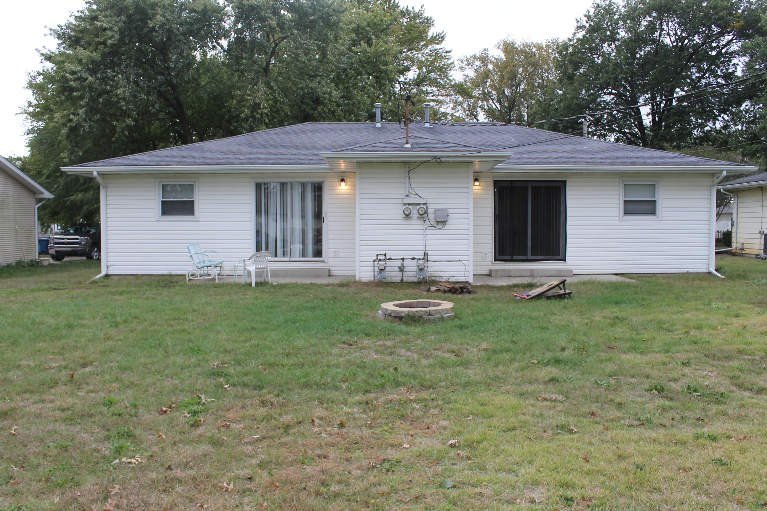 1113 Carnation Street Southeast De Motte, IN 46310 - Photo 2 of 7 a front view of a house with garden
