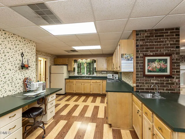 a view of a patio with a table chairs and a patio