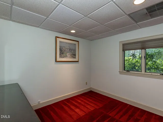 a view of balcony with wooden floor and fence