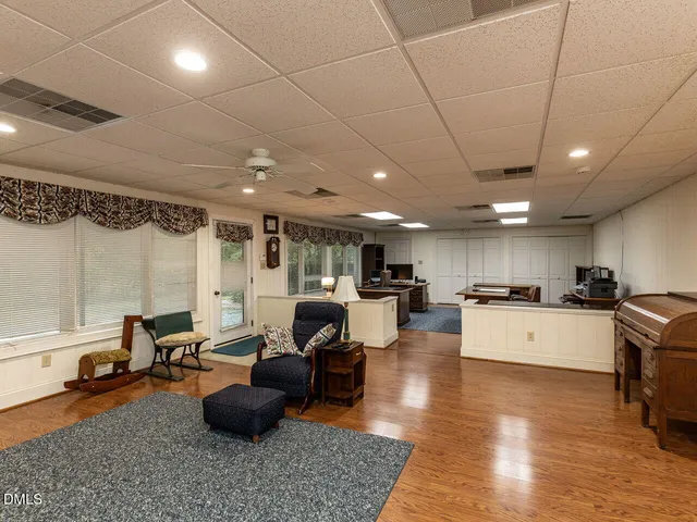 an aerial view of residential building and ocean view