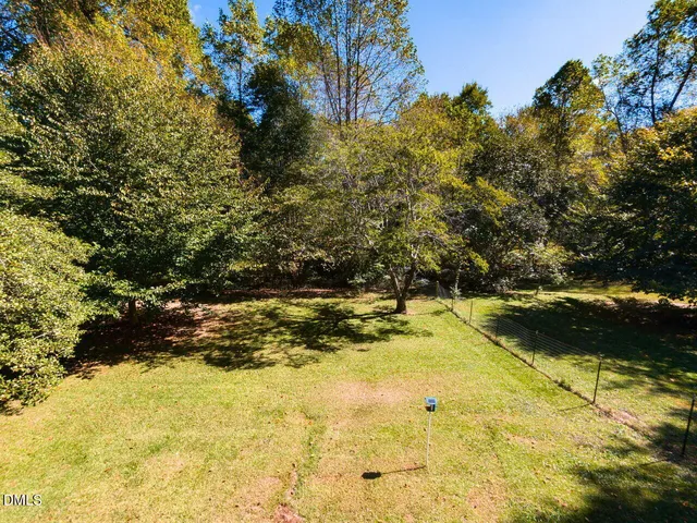 a view of a swimming pool with an outdoor space