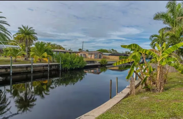 a view of a house with a lake