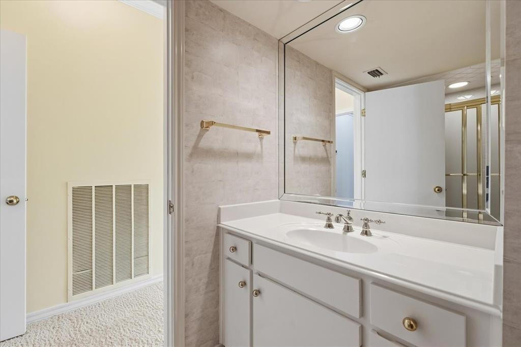 22 1 Main Place Benbrook, TX 76126 - Photo 31 of 40 a bathroom with a sink double vanity and a mirror