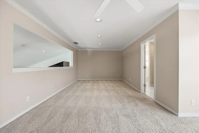 an empty room with a empty space and windows