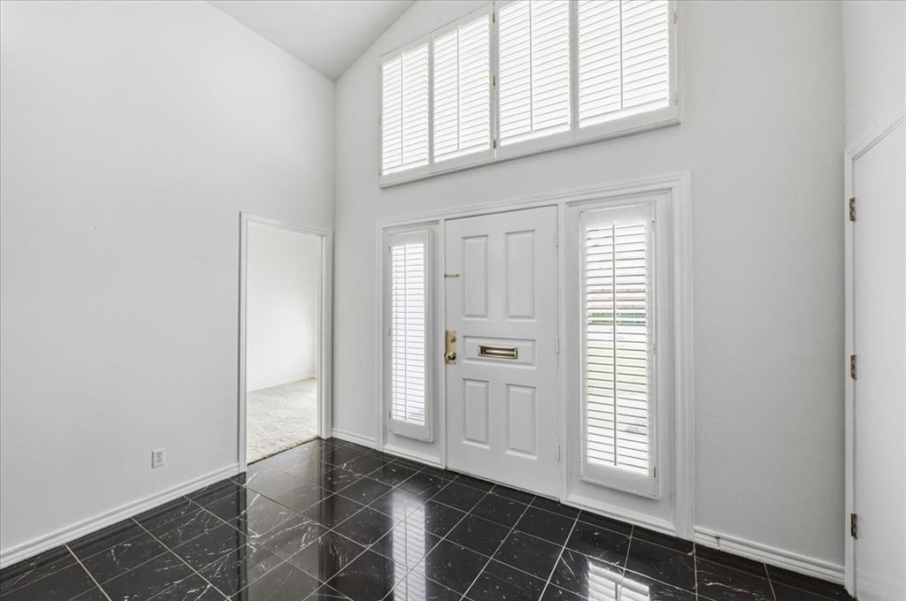 22 1 Main Place Benbrook, TX 76126 - Photo 4 of 40 an empty room with windows