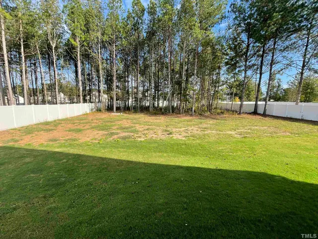 a view of an outdoor space and swimming pool