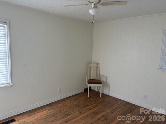 3166 Holly Road Connelly Springs, NC 28612 - Photo 24 of 41 an empty room with wooden floor fan and windows
