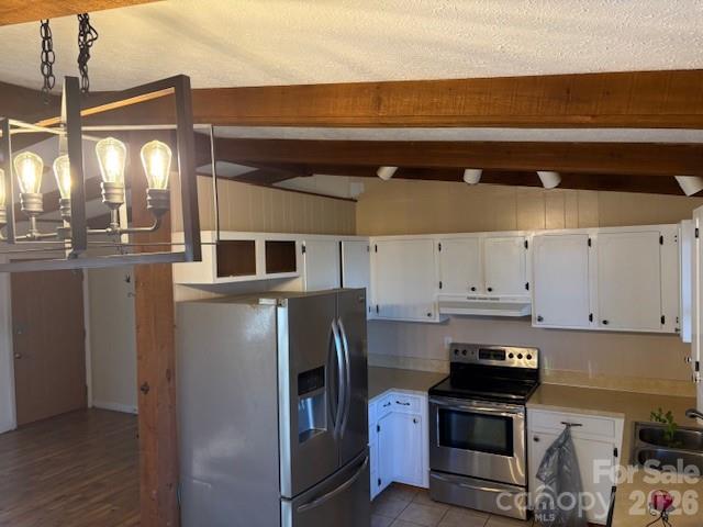 3166 Holly Road Connelly Springs, NC 28612 - Photo 28 of 41 a kitchen with stainless steel appliances granite countertop a refrigerator and a stove