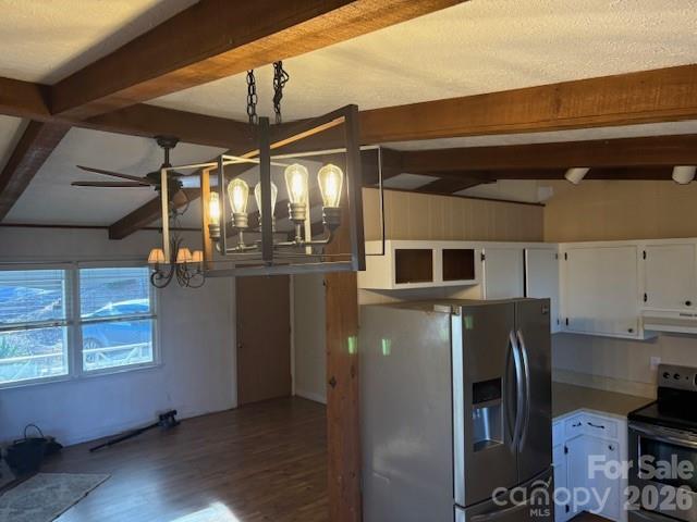 3166 Holly Road Connelly Springs, NC 28612 - Photo 29 of 41 a view of a refrigerator in kitchen and a window
