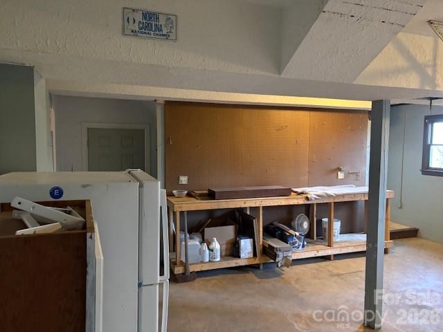 3166 Holly Road Connelly Springs, NC 28612 - Photo 41 of 41 a room with wooden floor and furniture