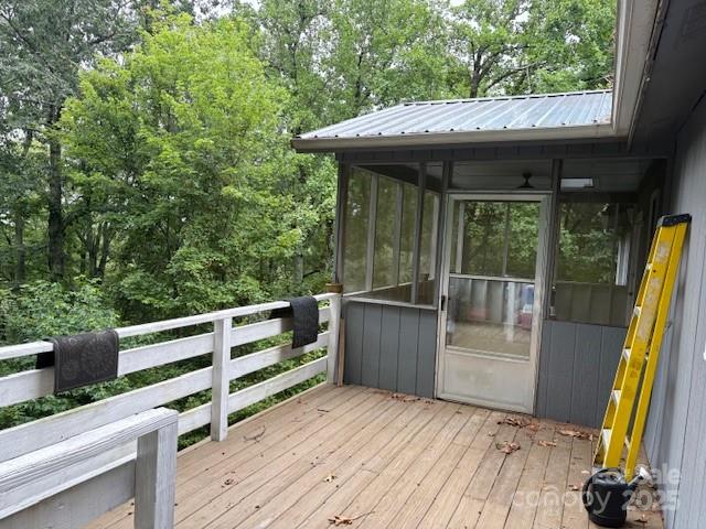 3166 Holly Road Connelly Springs, NC 28612 - Photo 9 of 23 a view of backyard with wooden floor and outdoor seating