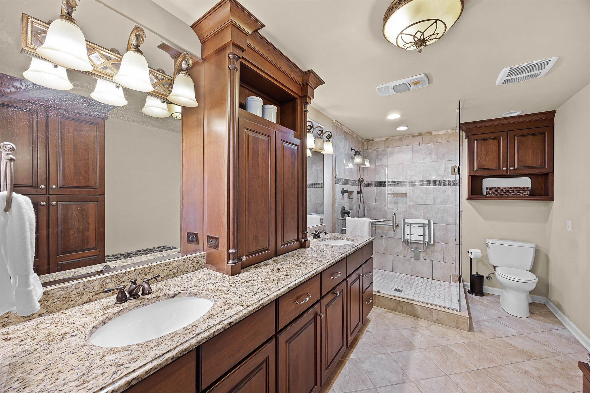 40 Vantage Pointe Counce, TN 38326 - Photo 12 of 25 a spacious bathroom with a granite countertop double vanity sink a mirror and a shower