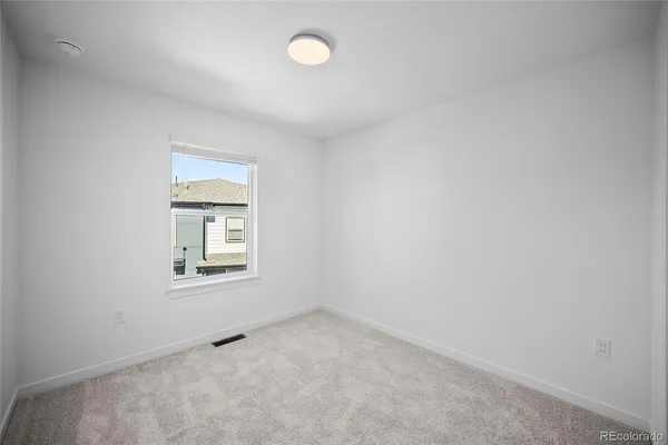 an empty room with closet