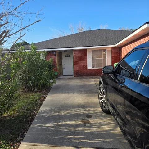 a backyard of a house with seating space
