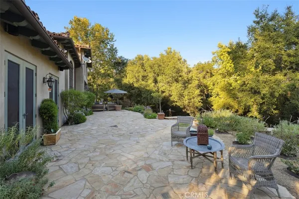 a view of a back yard of the house