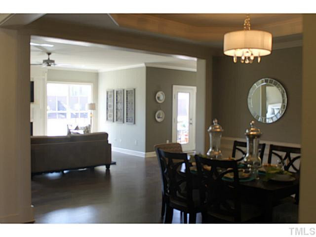 228 Springtime Fields Lane Wake Forest, NC 27587 - Photo 7 of 21 open floor concept between dining and family room