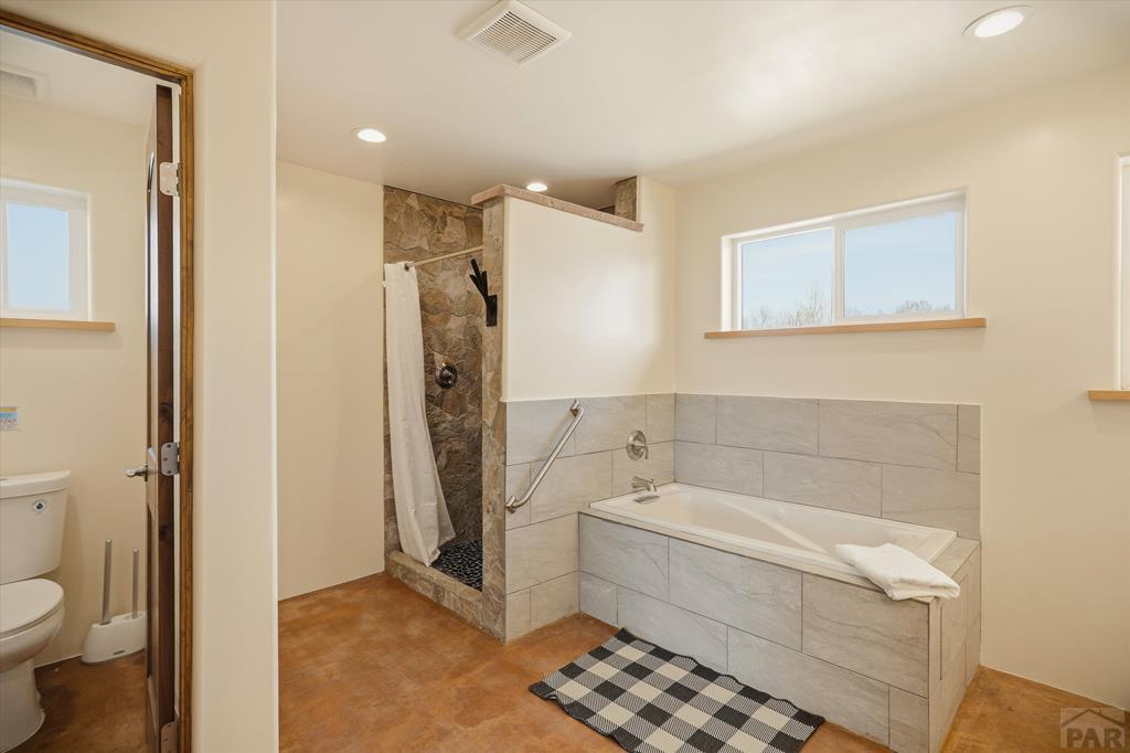 14285 County Rd E 5 Antonito, CO 81120 - Photo 37 of 72 a bathroom with a sink a toilet and shower