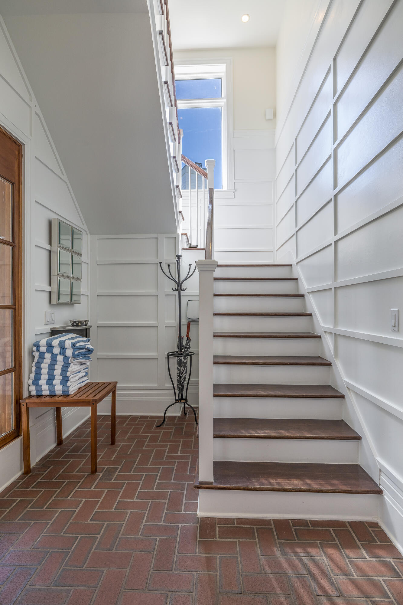 8104 Inspiration Drive, Unit C1 Miramar Beach, FL 32550 - Photo 16 of 29 a view of entryway with wooden floor and stairs