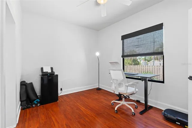 a room with furniture and wooden floor