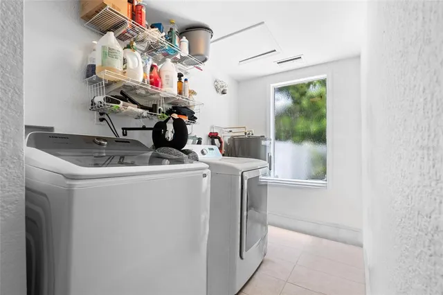 a storage room with washer and dryer