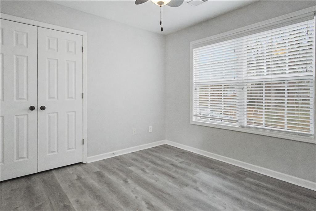 408 Long Branch Way Canton, GA 30115 - Photo 23 of 43 a view of an empty room with a window