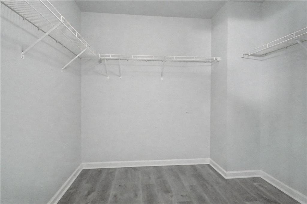 408 Long Branch Way Canton, GA 30115 - Photo 29 of 43 a view of an empty walk in closet