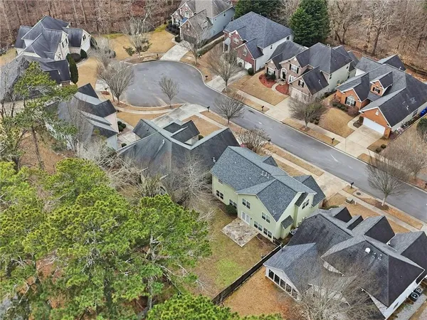 an aerial view of residential house with outdoor space