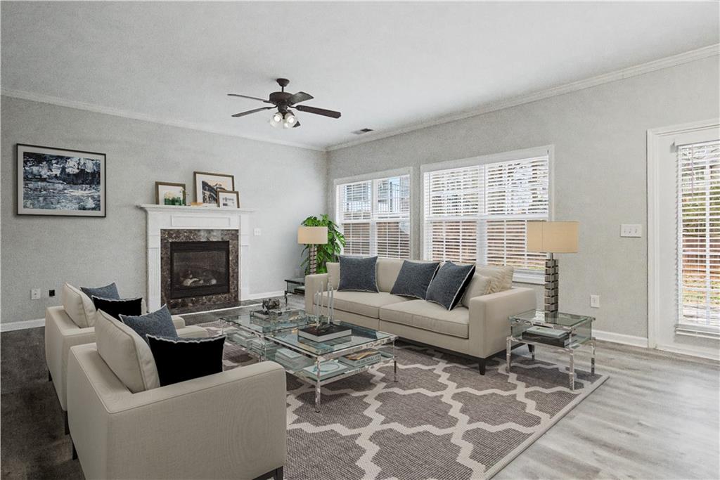 408 Long Branch Way Canton, GA 30115 - Photo 7 of 43 a living room with furniture a fireplace and a window