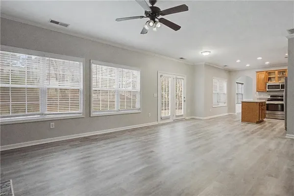 a view of an empty room with a window