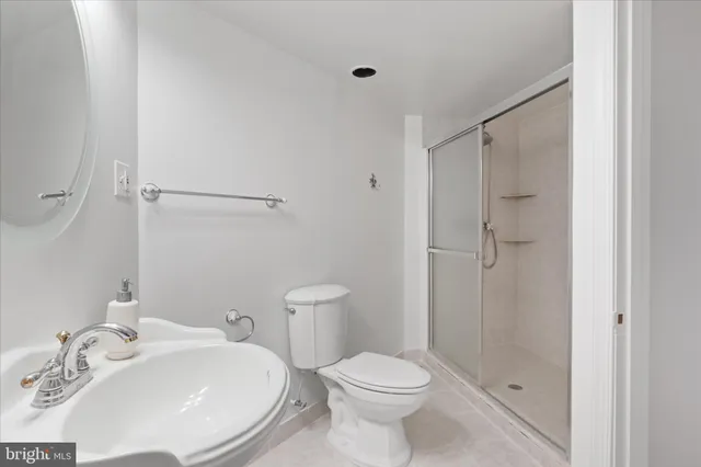 an aerial view of a house with a yard and plants