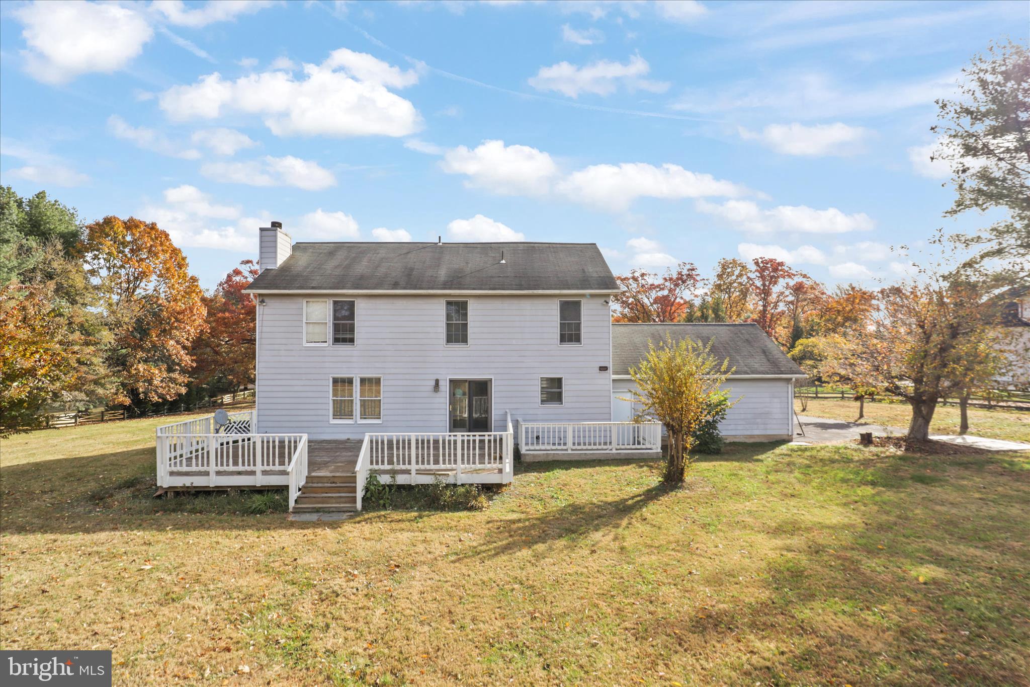 836 Utterback Store Road Great Falls, VA 22066 - Photo 21 of 30 a view of a house with a patio