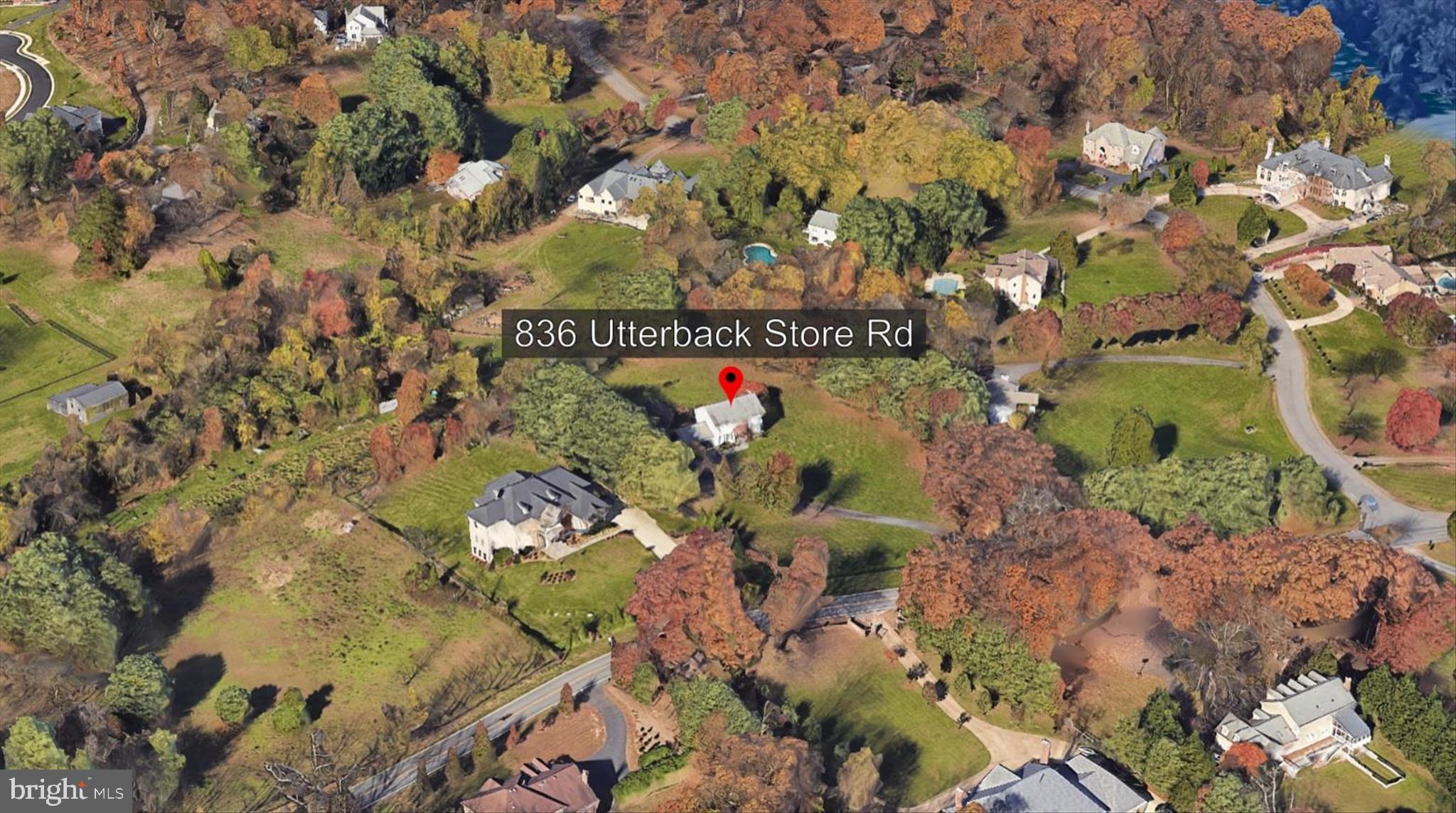 836 Utterback Store Road Great Falls, VA 22066 - Photo 22 of 30 an aerial view of a house with a yard and plants